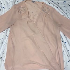 Beautiful Light pink blouse, must wear a undershirt.